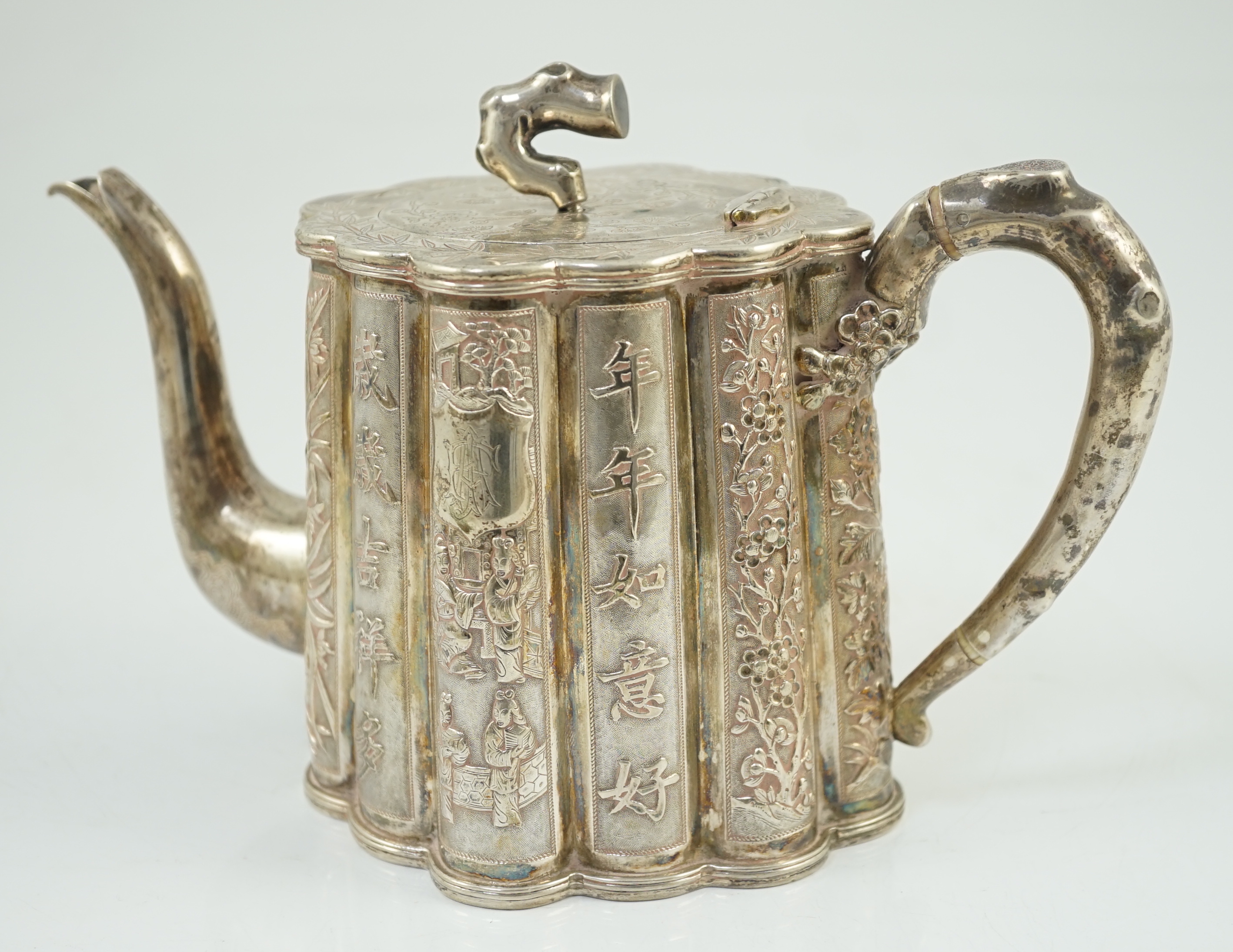 A late 19th/early 20th century Chinese Export silver teapot, by Luen Wo, Shanghai